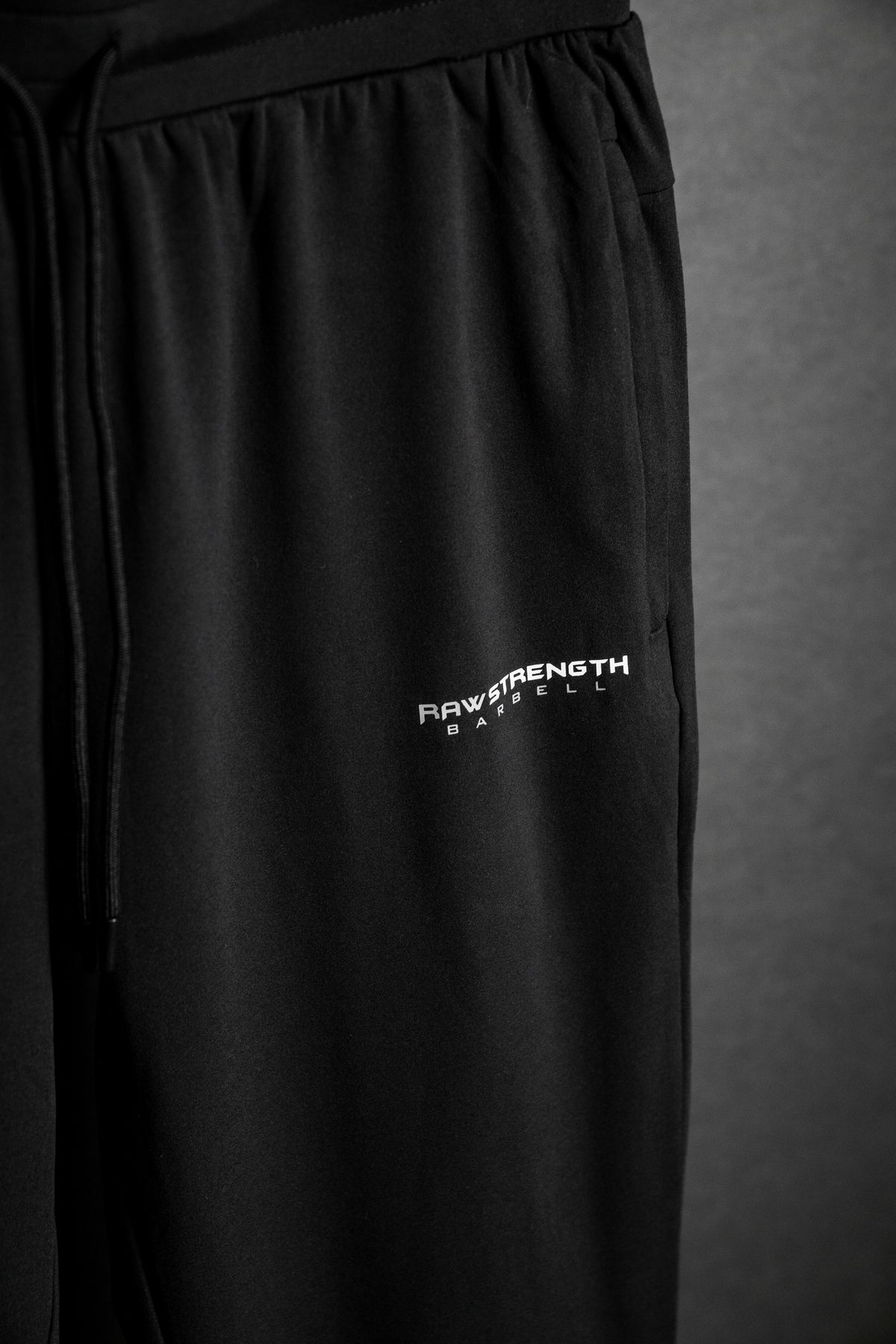 RAW STRENGTH BARBELL UNISEX PERFORMANCE BLACK 4-WAY STRETCH JOGGERS
